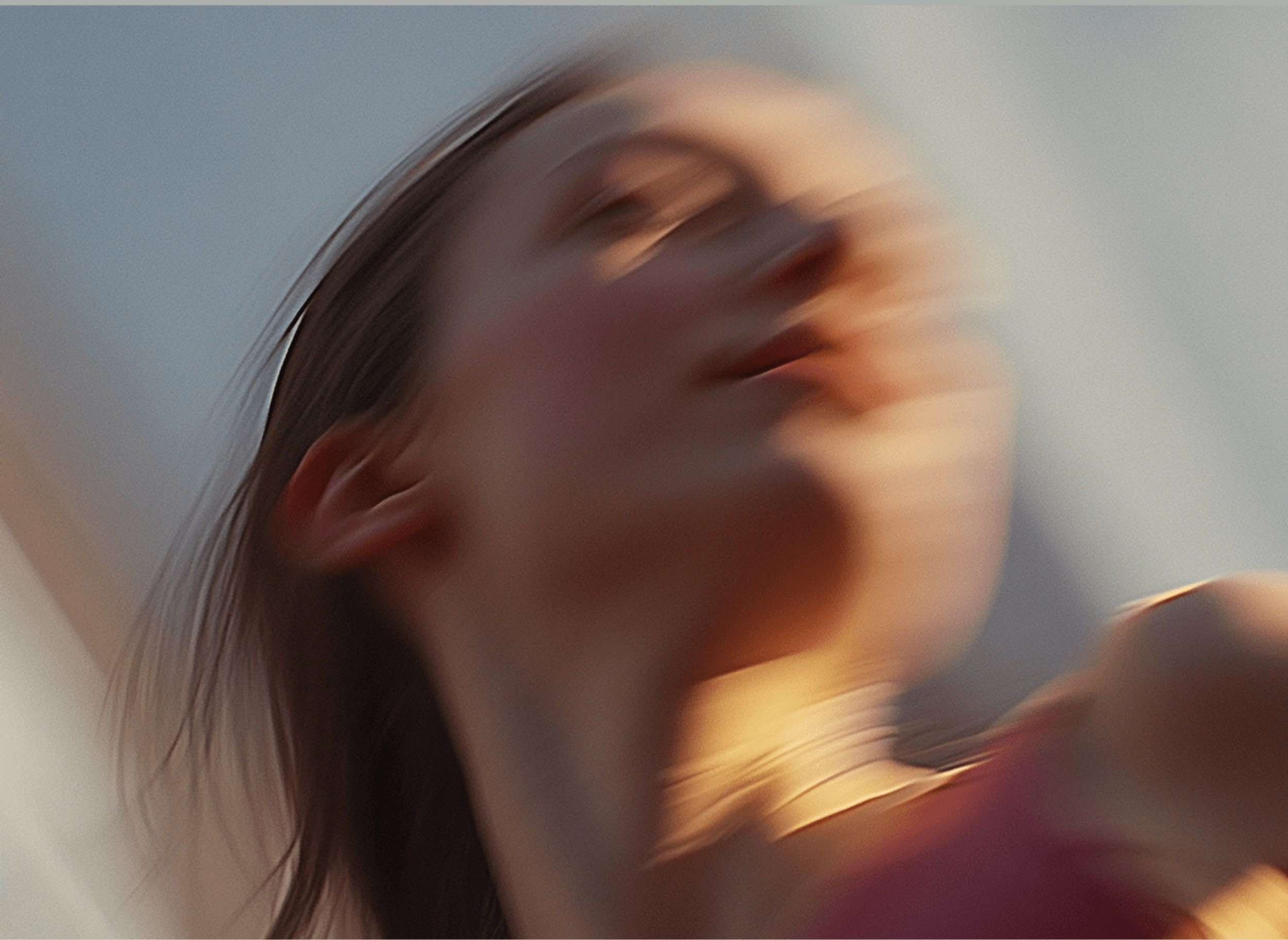 Blurred portrait of a woman looking up
