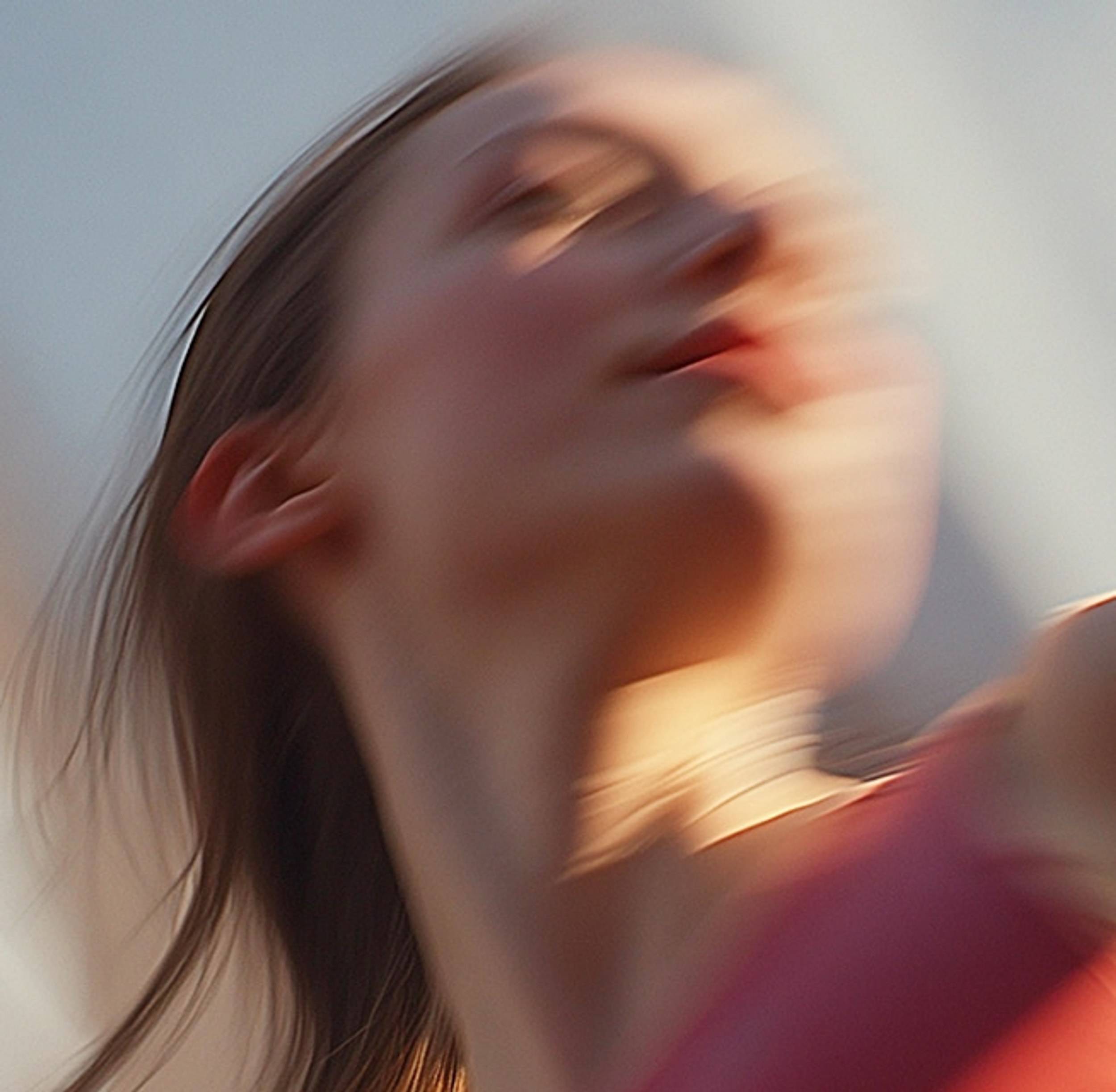 Blurred portrait of a woman looking up
